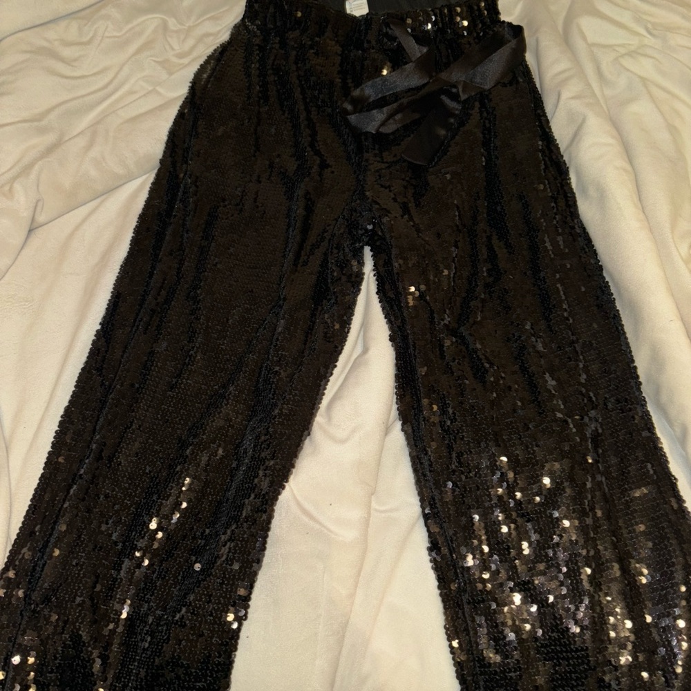 Glittery wide legged pants from a boutique